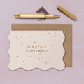 Congrats Newlyweds Scallop Edge Wedding Greeting Card With Gold Foil Detail Flat Lay With Pen