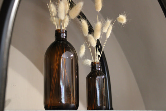 Dried Flowers In Amber Vases Display - Leocadia Dartmouth Shop Interior Display